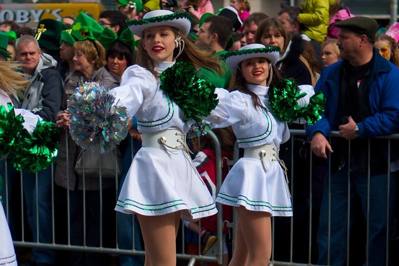 St. Patrick's Day cheerleaders at a festival.