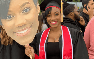 A student at their college graduation with a BigHead cutout.