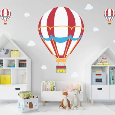 Large hot air balloon wall decal in child's play room.