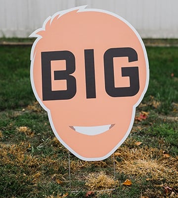 24 inch BigHead on a yard stake displayed in a lawn.