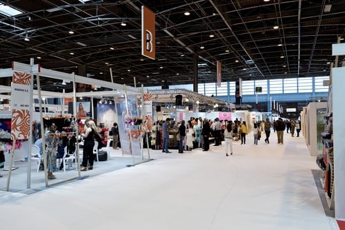 Exhibitor booths at a trade show.